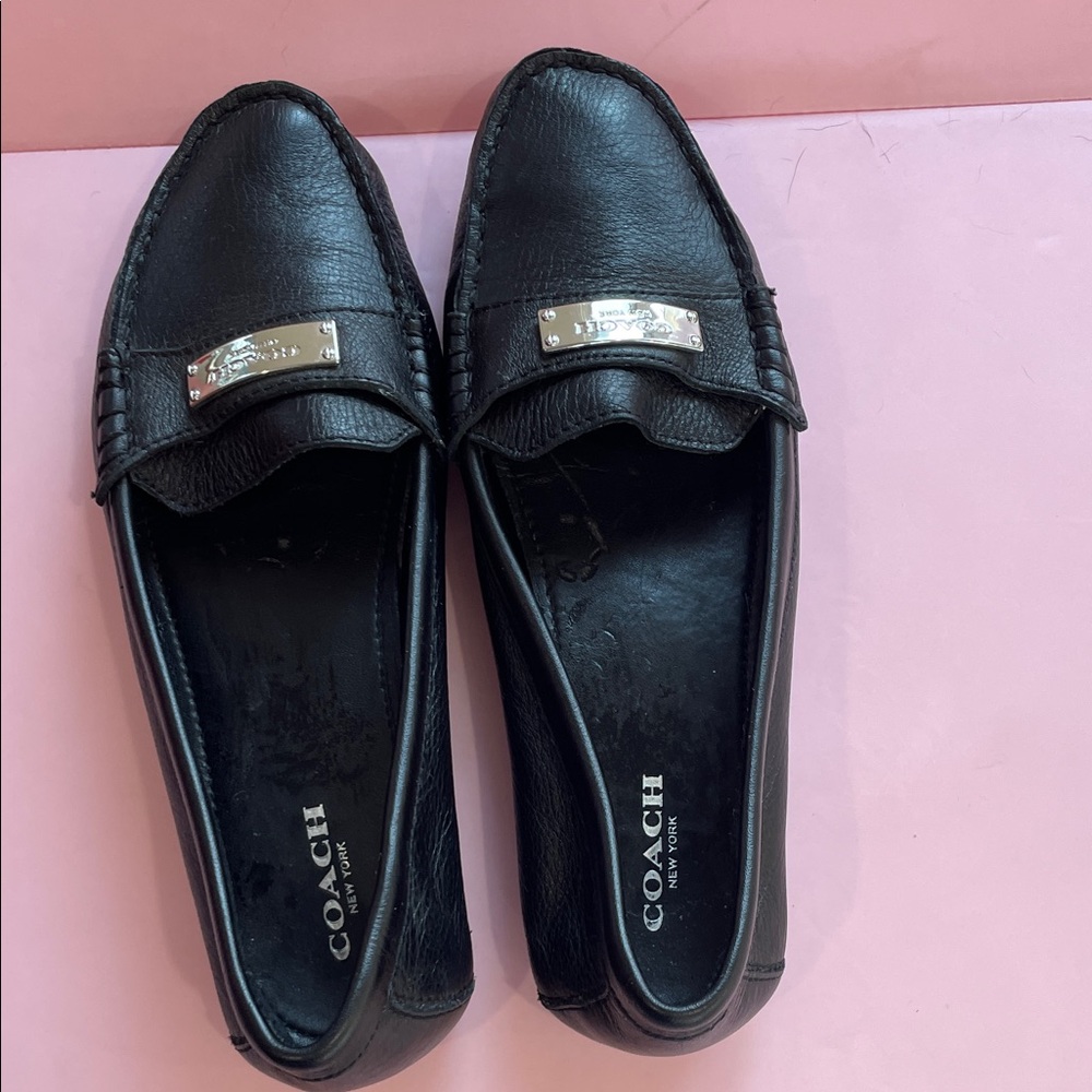 Coach 7.5 Black Leather Slip-On Loafers with Silver Plaque